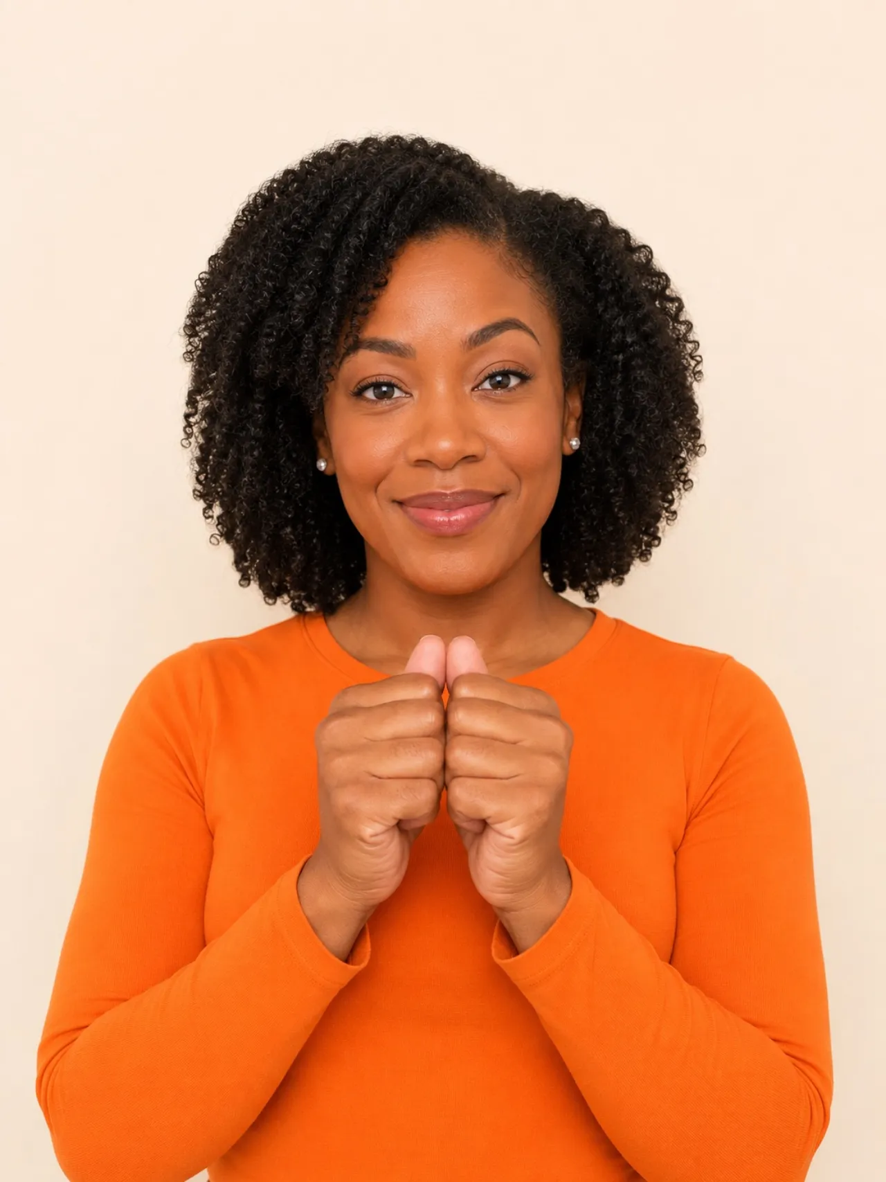 Portrait of a Black professional, calm confidence, the right person for the moment.